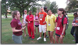 Students listening to leader talk